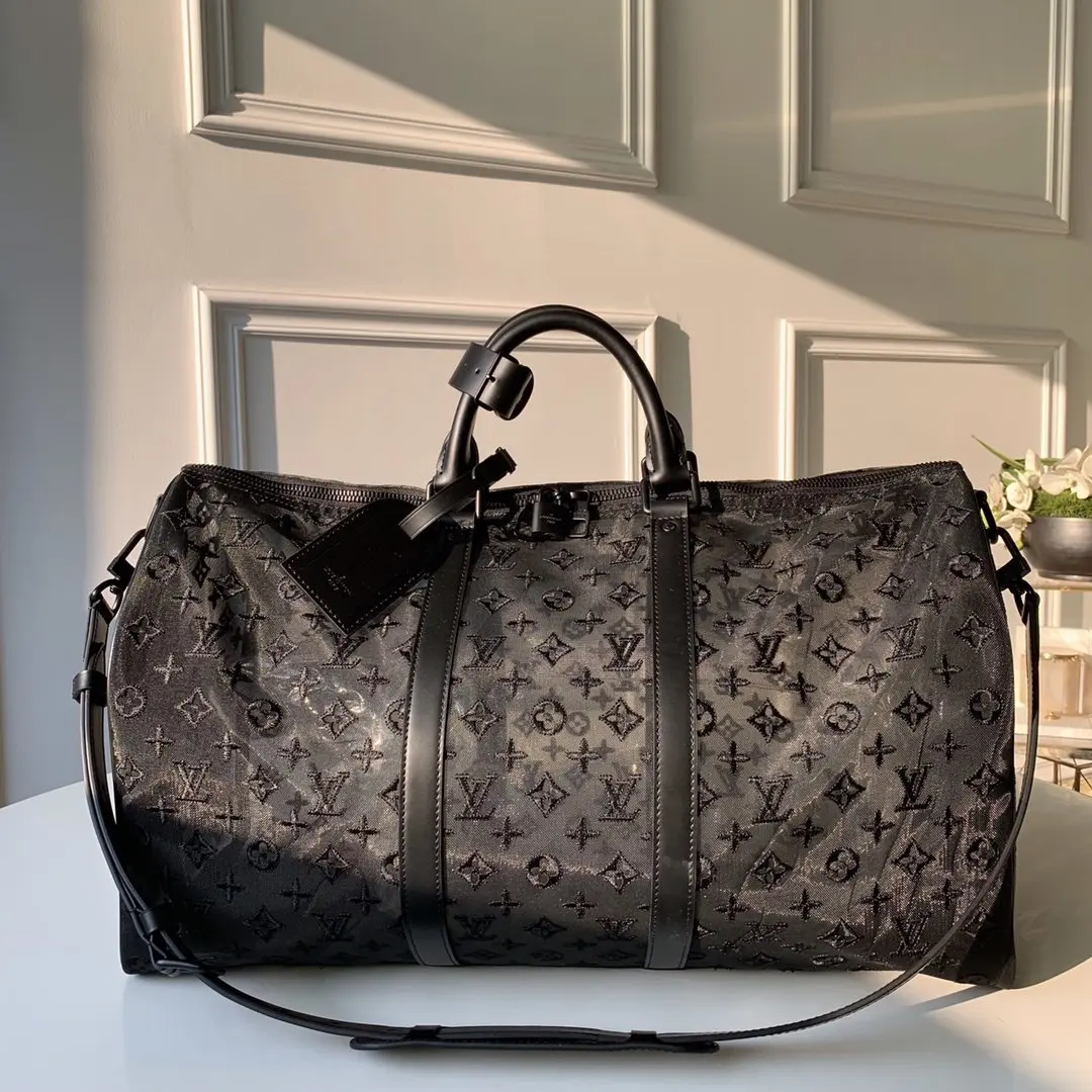 2019 monogram embossed keepall bandouliere 50 m53971 3 2019 monogram embossed keepall bandouliere 50 m53971 3