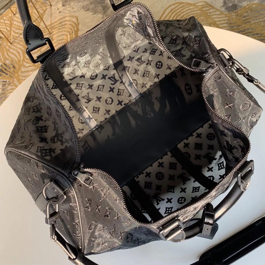2019 monogram embossed keepall bandouliere 50 m53971 8 2019 monogram embossed keepall bandouliere 50 m53971 8